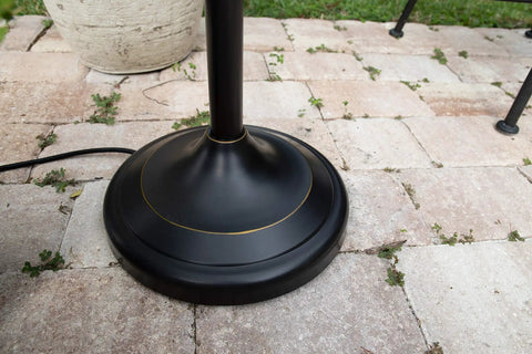 Base of Castillo Outdoor Floor Lamp With Oil Rubbed Bronze Highlight Finish on patio, 62 inch tall, 12.5 inch wide