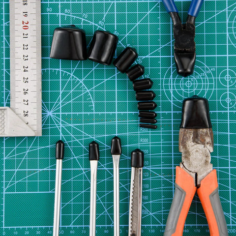 320 Pieces Black Rubber End Caps Set With Round Vinyl Caps For Bolt And Screw Protection arranged on a grid board with tools.