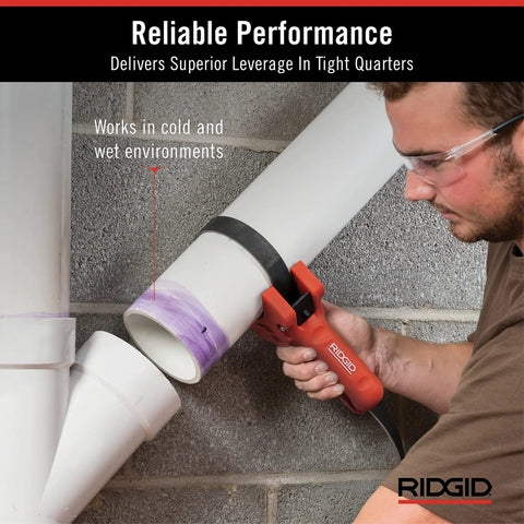Straplock 7 Inch Strap Wrench Pipe Handle With Locking Design in use on plastic pipe in cold, wet environment shown at angle.