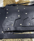 Close-up of Medieval Faux Leather Double Pauldron Shoulder Armor for LARP, black layered faux leather with rivet details