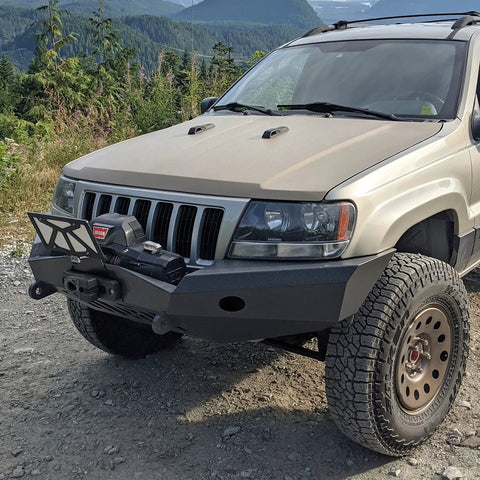 Flipster V3 Winch Plate Mounting System For 4x4s Featuring Hawse Roller And Recessed Fairlead Compatibility Stainless Hardware High Torque Hinge UV Rated Powder Coat Finish Built To Take On Tough Trails Fits Standard 10 Inch Winch Fairleads on a Jeep front bumper