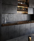 White Kitchen Faucet With Pull Down Magnetic Docking Sprayer, Modern Stainless Steel Deck Mount in a sleek, dark kitchen setting.