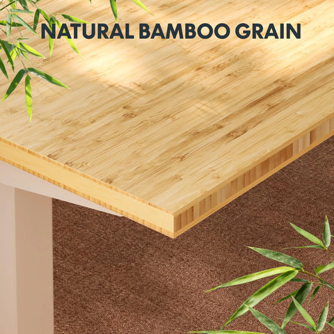 Close-up of natural bamboo grain on the Adjustable Height Solid Bamboo Standing Desk 60 By 30 Inches With Sturdy Black Steel Frame.