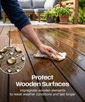Natural Linseed Oil Wood Protector And Clear Varnish 500 Ml applied to wooden deck, enhancing shine and protection.
