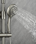 Riviera Shower System With 8-Inch Rain Showerhead, Five-Function Hand Shower in brushed nickel, water flow visible