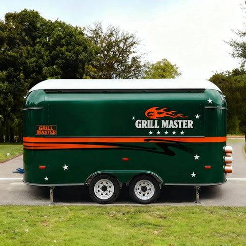 Side view of a green turnkey mobile food truck and portable snack cart with 'Grill Master' branding for street food business.