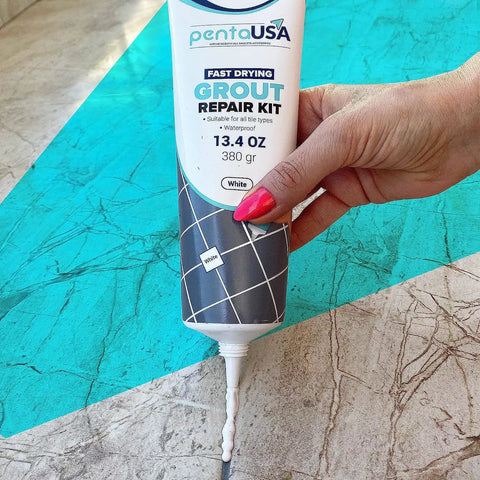 White Premixed Acrylic Sanded Grout Repair Kit With Applicator, 13.4 Oz being applied to tile floor crack, water resistant filler