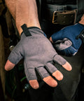Tough As Nails Fingerless Work Gloves For Men And Women Featuring Padded Palms Rock Solid Knuckle Protection And Exposed Fingertips For Straight Up Precision Control In X Large, showing a gray fingerless glove in hand.