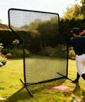 Player using Z Screen Pitching Net 5x7 Ft Portable Baseball Backstop For Backyard And Field Training Adjustable Height Softball Batting Practice Shield Durable Nylon Construction For Adults And Youth With Strike Zone.