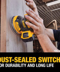 20V Max Brushless Random Orbital Sander Kit sanding wood with variable speed, highlighting dust-sealed switch and durability for finish work.