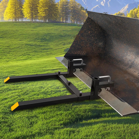 60 Inch Clamp On Pallet Forks For Tractor Bucket Built Tough With 2000lbs Capacity, shown attached to a bucket on grassy field.