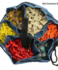 Top view of Portable Small Parts And Tools Bag With Loop Handles, 5-Inch Divider Pockets, Drawstring Opening, filled with wire connectors.