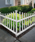Two Panel No Dig Vinyl Picket Fence Set, 40In Wide by 30In High, white corner garden border fencing installed around shrubs.