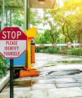 Tough As Nails Custom Stop Sign 18 X 18 Inches with clear instructions at a gated entry for vehicle security.