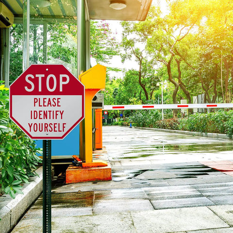 Tough As Nails Custom Stop Sign 18 X 18 Inches with clear instructions at a gated entry for vehicle security.