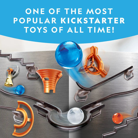 Magnetic Marble Run 75 Piece STEM Building Set with magnetic tracks and trick pieces shown on a metal surface.