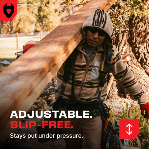 Built Tough Safety Glasses With Anti Fog Wrap Around Lenses And Scratch Beater Coating Plus Grip Lock Temples And Genuine Uv Blocking For Your Daily Grind In Black Green Tinted 10 Pack worn by a worker carrying heavy lumber.
