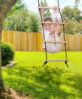 Child using Rope Ladder For Kids Climbing Obstacle Course With Sturdy Wood Beams And Top Hooks, Hanging Ladder For Swing Set outdoors