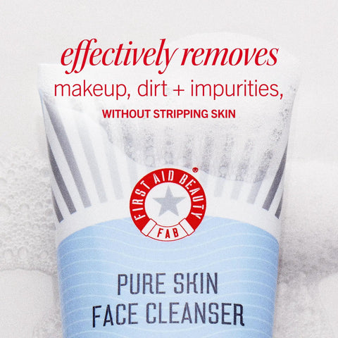 Close-up of First Aid Beauty Pure Skin Face Cleanser with text highlighting makeup removal features.