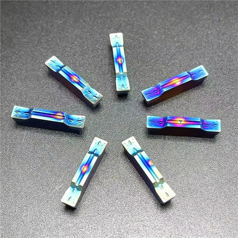 10Pcs CNC Grooving Carbide Inserts For Stainless Steel And Metal Lathe Tools Pro Grade MGMN200G KT7030 arranged in a circle on a surface.