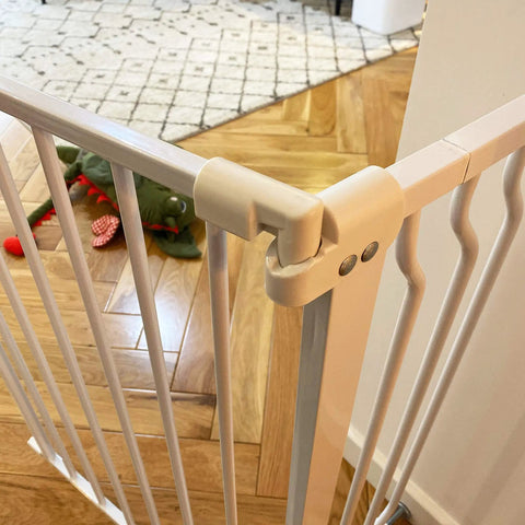 Extra Wide Baby Gate For Openings From 29.1 To 62.2 Inches Warm White Finish Pressure Mounted No Screws Needed Easy One Hand Operation Safe Gate For Kids And Pets In Doorways And Hallways showing corner detail