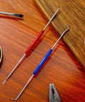 Beefy And Reliable Double Pointed Scriber Set With Knurled Aluminum Grip Rust Proof Steel Marking Hooks on wood surface.