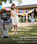 FlexBreeze Pro Mist Fan Indoor Outdoor Chill Machine in use at outdoor party, pedestal setup, oscillating, cordless for portability