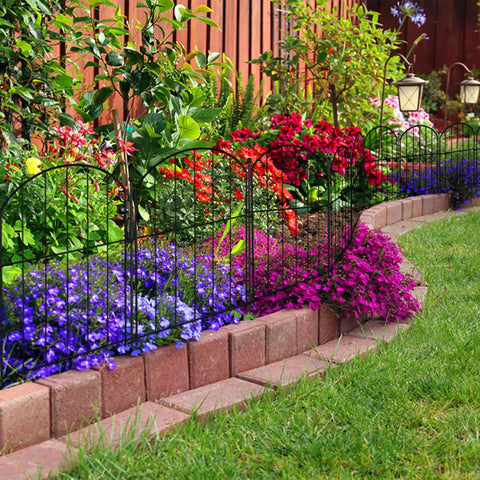 Garden Fence Panels Set Of 10 Arched Rustproof Metal Border Fence For Dogs And Pets No Dig Yard Edging installed in flower bed.