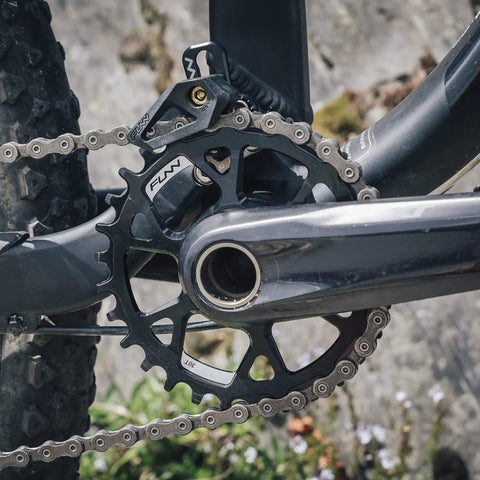 Close-up of Narrow Wide 30T Direct Mount Chainring For Shimano MTB Cranks, One Piece 7075 Aluminum CNC Finish, installed on bike
