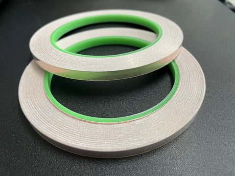 Copper Tape One Quarter Inch Double Sided Conductive Foil Tape For EMI Shielding Soldering Electrical Repairs Stained Glass Grounding Two Pack Twenty One Point Eight Yards Each, two rolls on black surface
