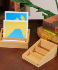 Big Beechwood Three Part Box For Montessori Language Cards with three compartments for sorting on a wooden table
