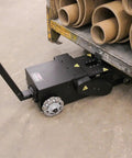 Massive 10K Lb Electric Industrial Tugger With Heavy Duty Steel Build Perfect for Moving Big Rig Vehicles, Features Sweet Variable Speed Control And Rechargeable Battery For All Day Work Without Dead Air under a cart.