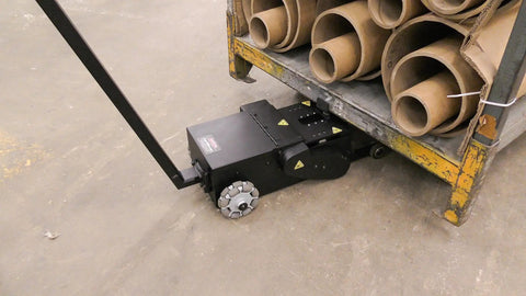 Massive 10K Lb Electric Industrial Tugger With Heavy Duty Steel Build Perfect for Moving Big Rig Vehicles, Features Sweet Variable Speed Control And Rechargeable Battery For All Day Work Without Dead Air under a cart.