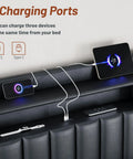 Three charging ports on Heavy Duty Black King Size Platform Bed Frame With Padded Headboard for device connectivity.
