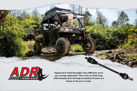 Polaris Ranger on rugged terrain featuring Beefed Up ADR Front Axle For Polaris Ranger 1000 And XP 1000, Chromoly Steel Construction USA Made