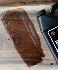 100 Percent Pure Tung Oil Wood Finish For Any Project No VOCs Food Safe FDA Food Contact Safe Ingredients 32 oz jug on wood