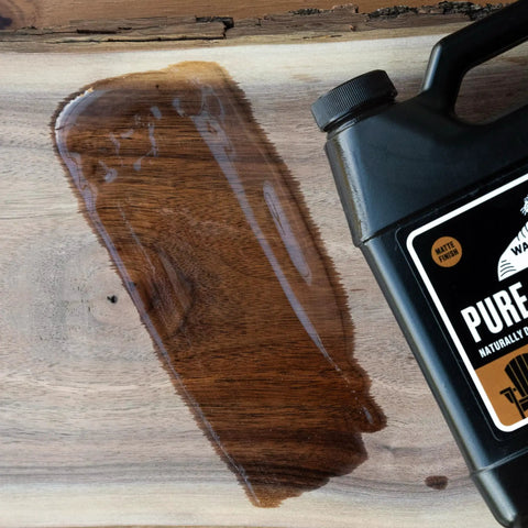 Straight Out The Bottle Tung Oil Wood Finish goes on pretty dang smooth on wood, 16 oz black jug with applied finish.