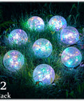 Dope Solar Globe Lights For Outdoor Pathway And Garden Waterproof LED Cracked Glass Balls 12 Pack at night on grass