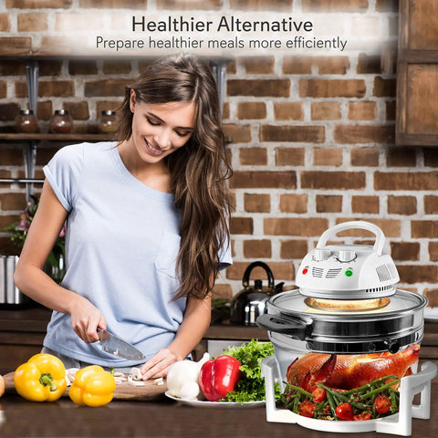 Smiling woman with infrared air fryer convection oven for countertop, halogen toaster style, 13 quart 1200W, cooking healthy meals