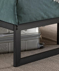 Queen Size Metal Platform Bed Frame With Reinforced Steel Slat Support And Absolutely No Box Spring Required No Sweat Assembly seen from side with luggage underneath.