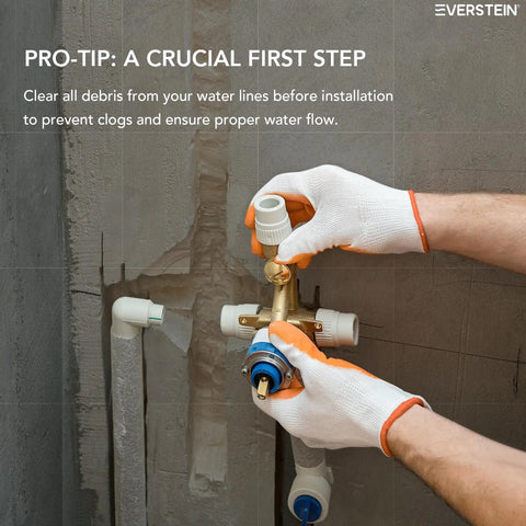 Installation of EVERSTEIN 12" Rainfall Shower System with Handheld Spray, Brushed Gold plumbing components.