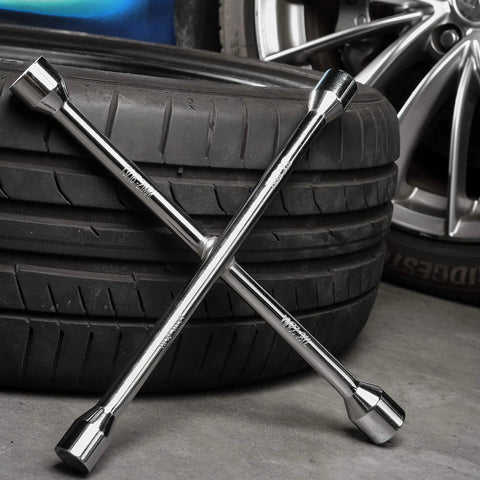 Beefy 14 Inch Heavy Duty 4 Way Lug Wrench Cross Socket Wheel Nut Key For Cars And Trucks Universal Fit Handles SAE 11/16 3/4 13/16 7/8 And Metric 17mm 19mm 21mm 22mm Chrome Plated Forged Carbon Steel crossed on stacked tires