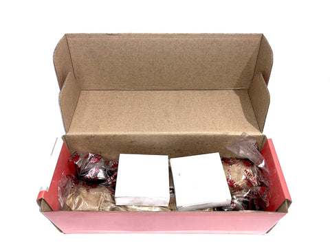 Open box of King Pin Kit 2.120x8.750 No Keyway With Bronze Bushings Tapered Front Axle For Mack FA616 FA617 FAW616 FAW617 FA54.