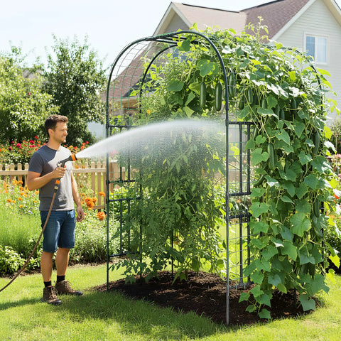 Big Ol 7.22 Foot Tall Double Arch Garden Trellis For Climbing Plants And Flowers with vines, man watering with hose