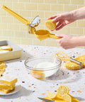 No Fuss Lemon Squeezer Citrus Juicer in use over mixing bowl on kitchen counter