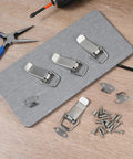 Spring Loaded Toggle Latch Set 4 Stainless Steel Latches With 18 High Quality Screws on wooden surface display