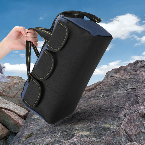 Side view of blue tool bag from Three Pack Tool Bags For Electricians And Carpenters, Waterproof Hard Bottom, 13 Inch on rocks