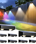 Solid Solar Fence Lights For Outdoor Deck Railings And Garden Pathways Featuring Smooth Color Changing RGB Cycles With IP65 Waterproof Design Great To Level Up Your Backyard Hangout And Serve Dope Nighttime Ambiance In An Eight Piece Set on a fence with colorful illumination.