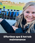 Woman holding Must Have All In One Hot Tub Chemicals Starter Kit for Easy Spa Maintenance with products displayed in background.