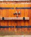 2x4 Door Barricade Brackets Heavy Duty U Shaped Security Holders on wooden garage doors, installed for protection and security
